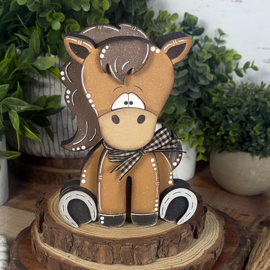Hand painted chunky wooden horse shelf sitter with brown mane, horseshoes and black gingham bow, rustic western decor